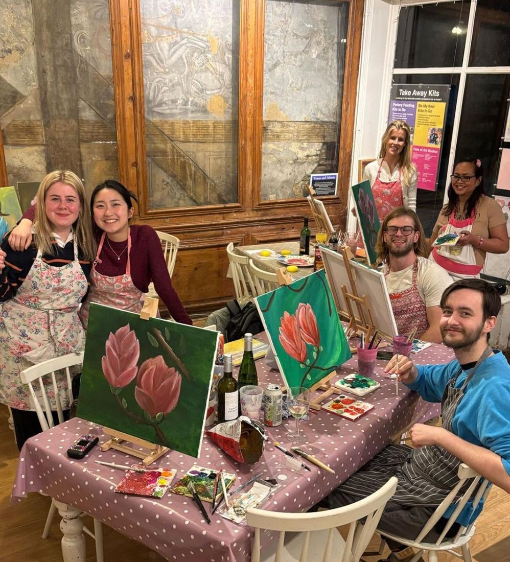 Adults at a canvas painting evening in St Albans